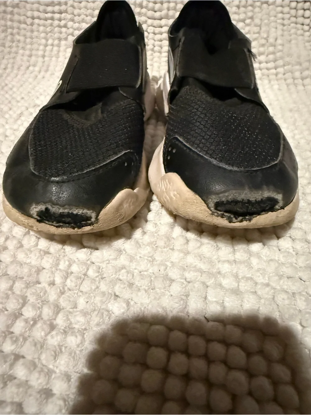 Nike Kids Black Slip-On Sneakers with White Swoosh